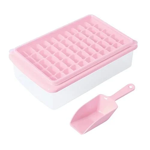 Pink ice cube mold and scoop on white background