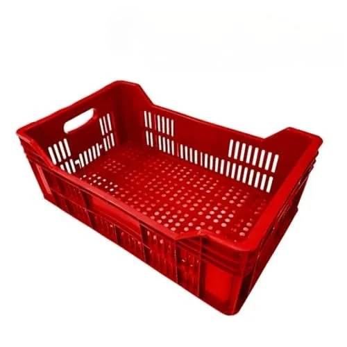 Red plastic shopping basket with ventilation holes and handles.