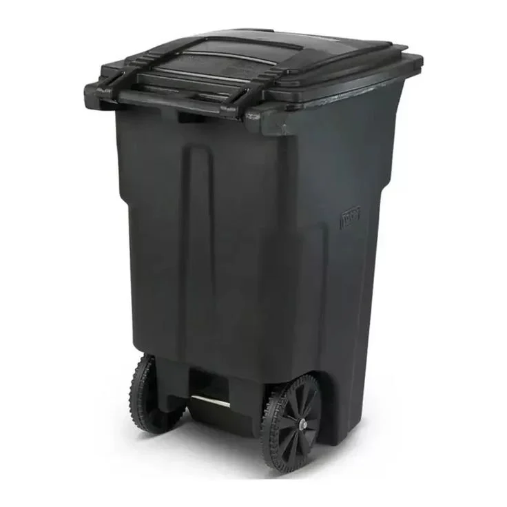A black wheeled trash bin with a closed lid.