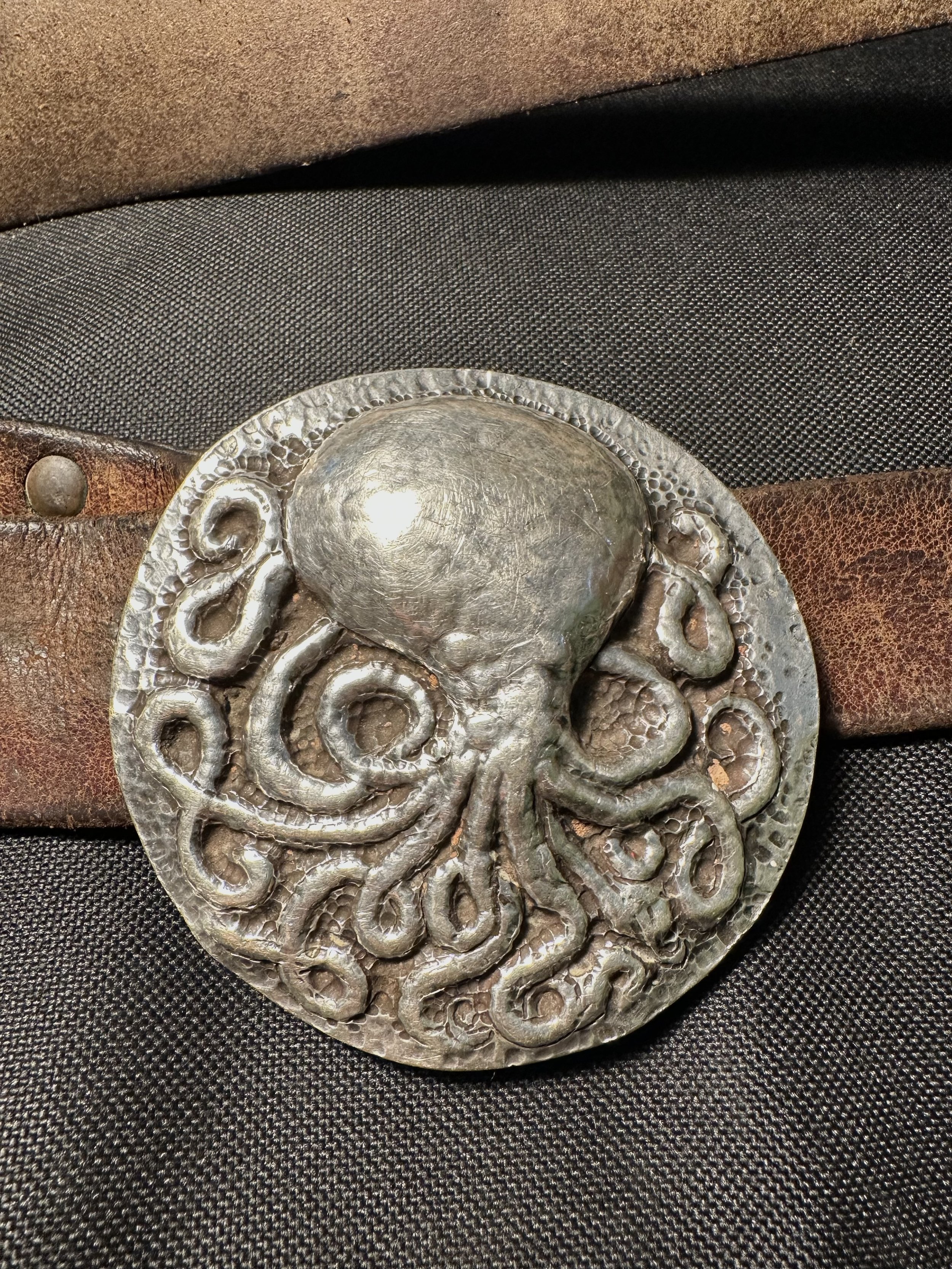 Hand hammered silver octopus belt buckle
