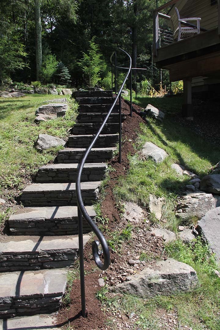 Steel forged staircase railing, private residence