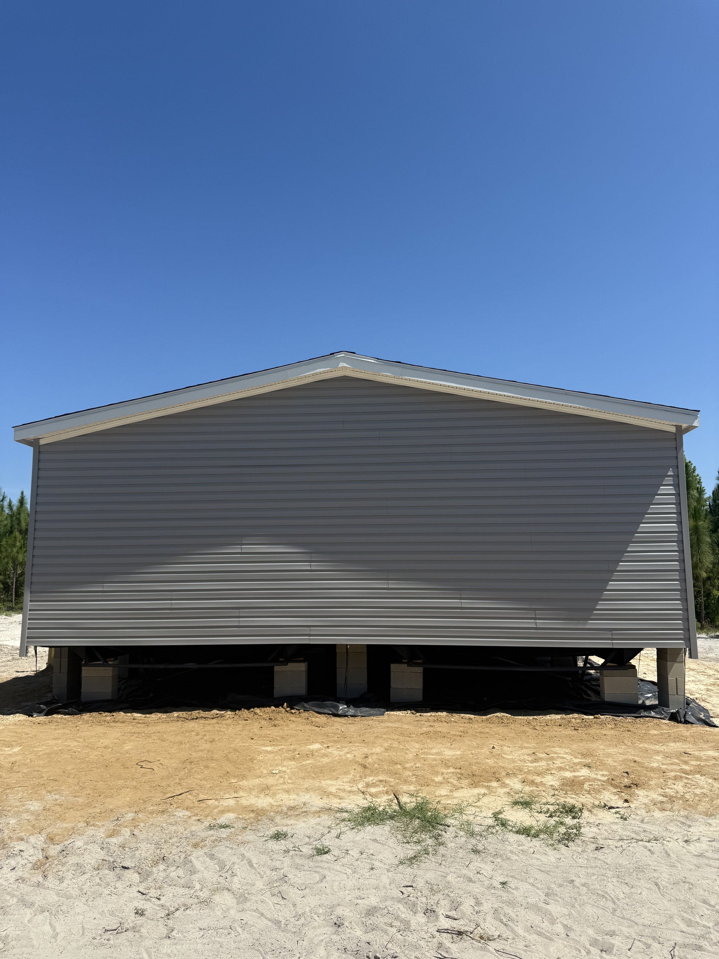 Siding on a mobile home in Old Town - check out that perfect pattern! :)