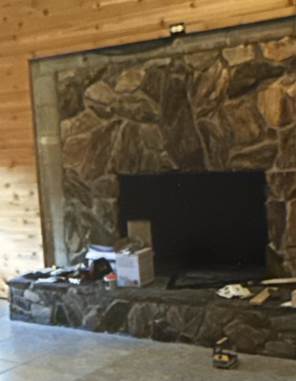 It was a lot of fun trying to piece together all of the stone to build this fireplace