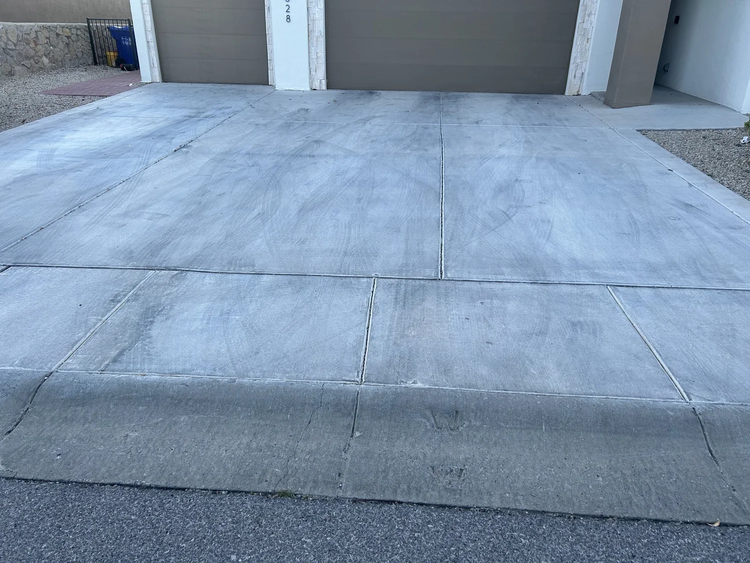 Dirty driveway before pressure washing in Las Cruces