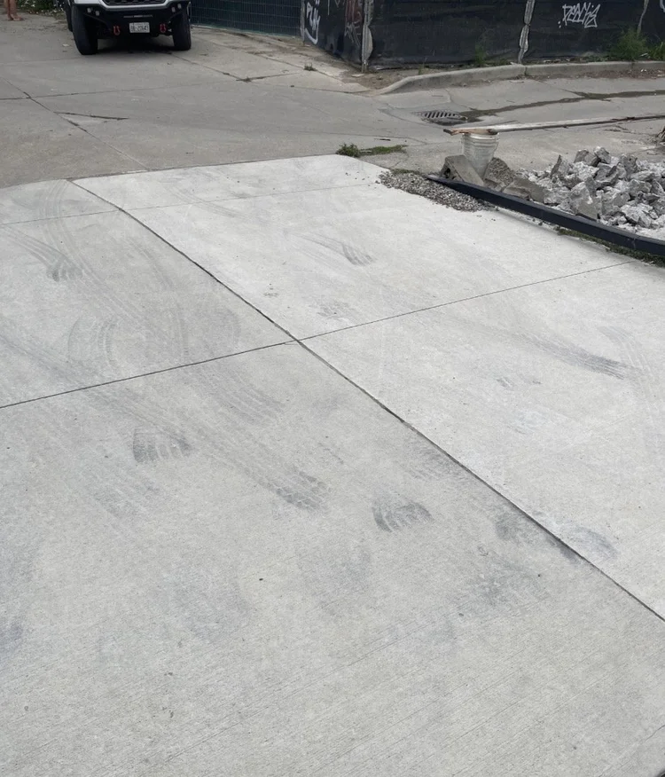 Black tire marks on concrete
