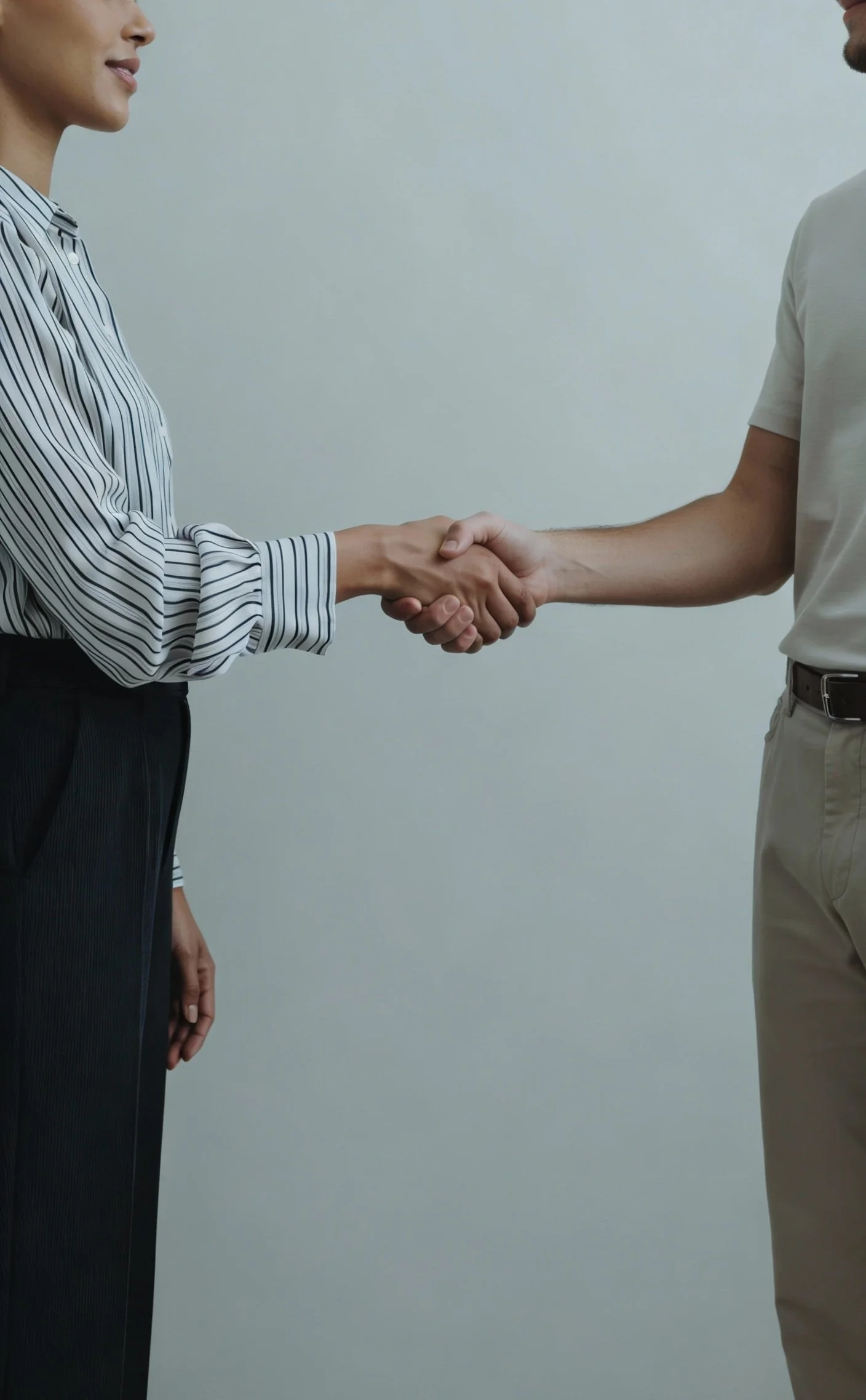 Professional handshake representing a consulting partnership with Restimulate Health