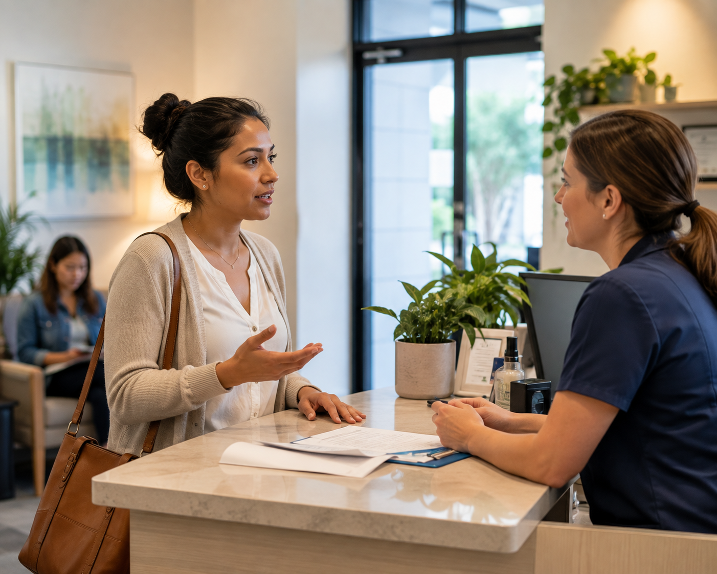 A woman calmly advocates for herself while speaking with a healthcare professional at a reception desk in a warm, welcoming clinic beneath the title “How to Advocate for Yourself in English Without Sounding Pushy.”