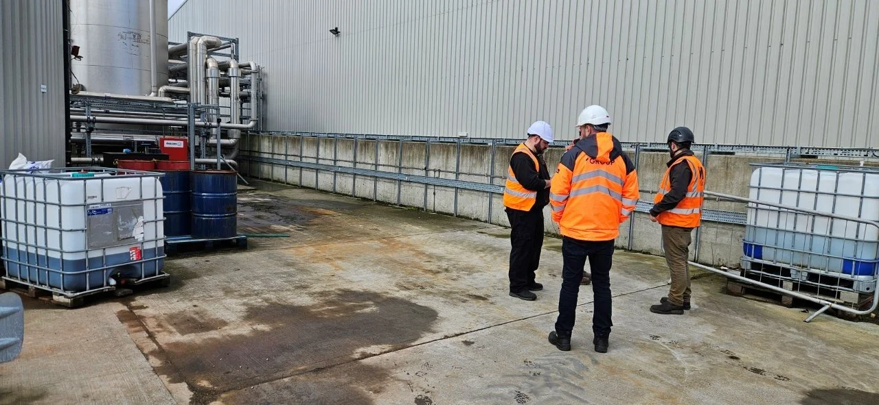 Health and safety visit, people in high vis jackets and hard hats