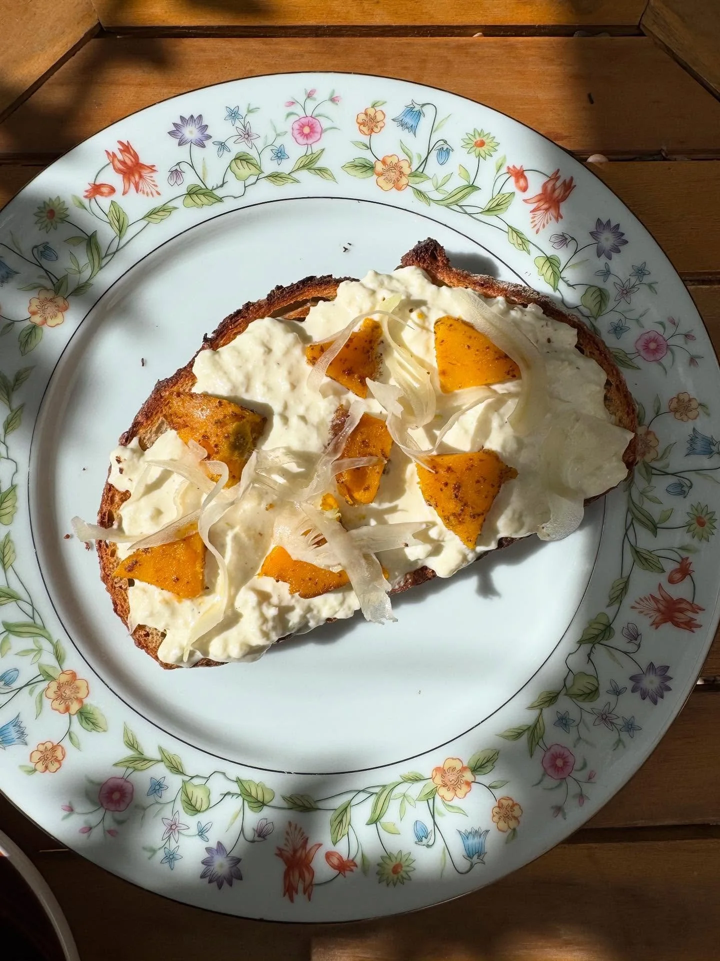NEW Seasonal Toast - Stratcciatella cheese topped with roasted Kobocha squash and shaved fennel.