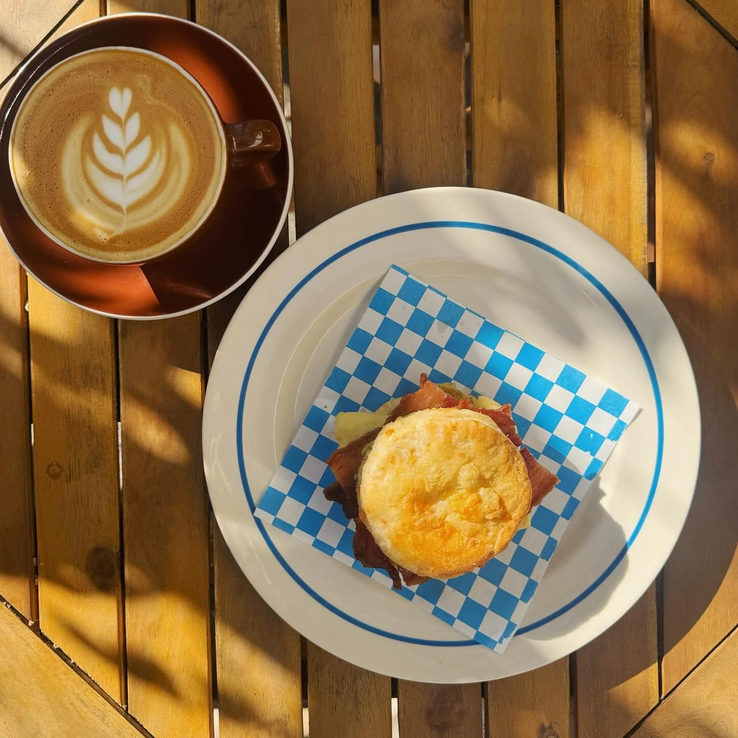 New to the menu : BREAKFAST SANDWICH - house made buttermilk biscuit made with hooks 5 year cheddar, herb aioli, scrambled egg with your choice of Tartine sage sausage, journeyman&rsquo;s barrel aged bacon, or avocado. 😘🤌