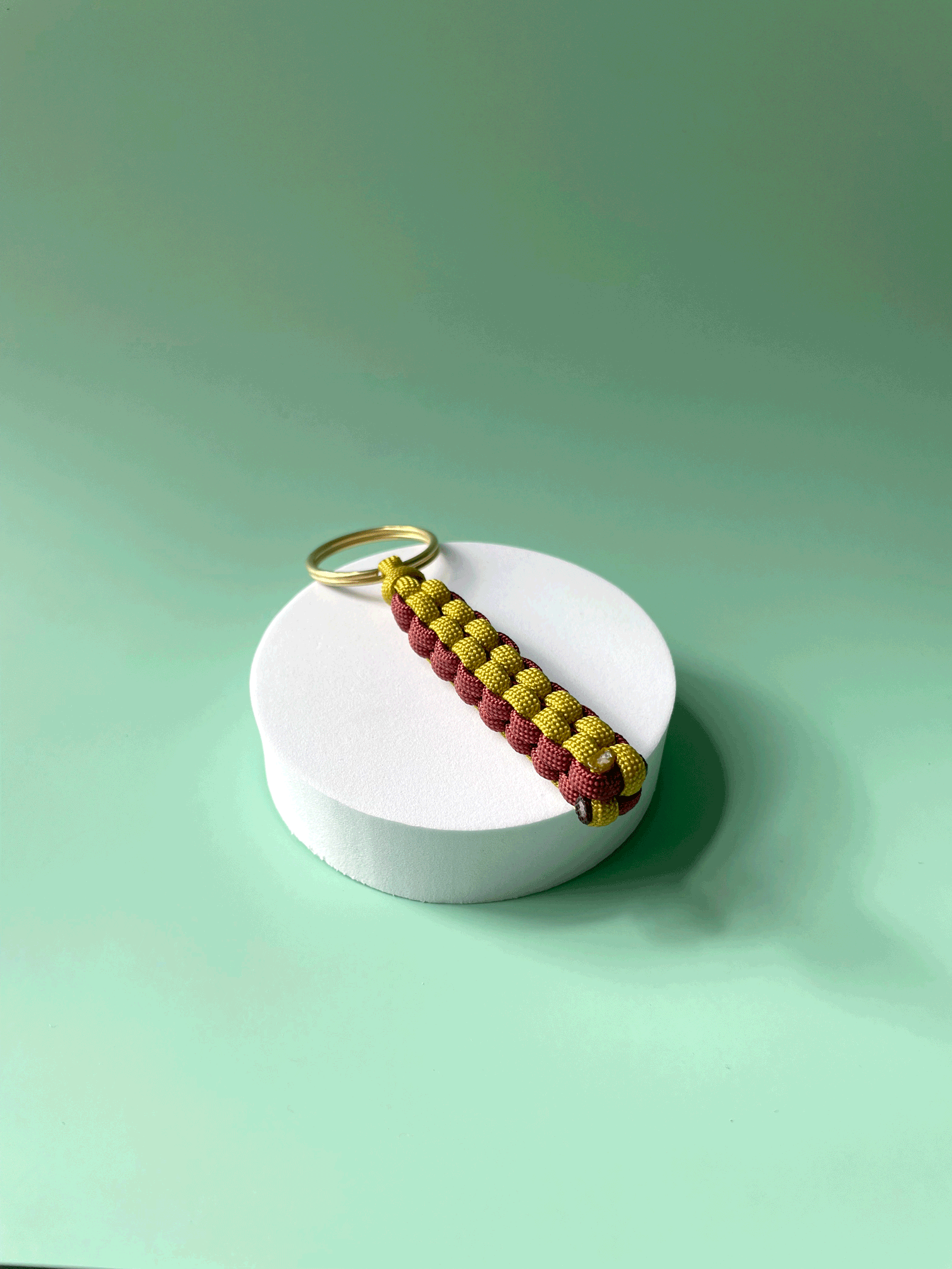 box_keyring_yellow_burgundy.png
