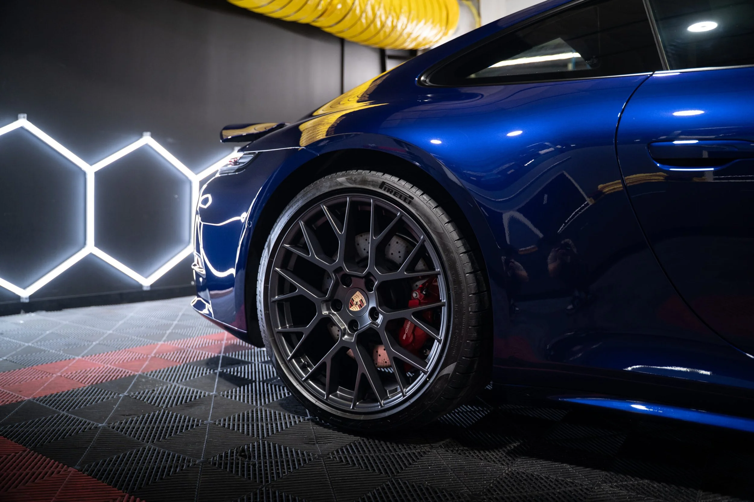 Blue Porsche Wheel With PPF Installed