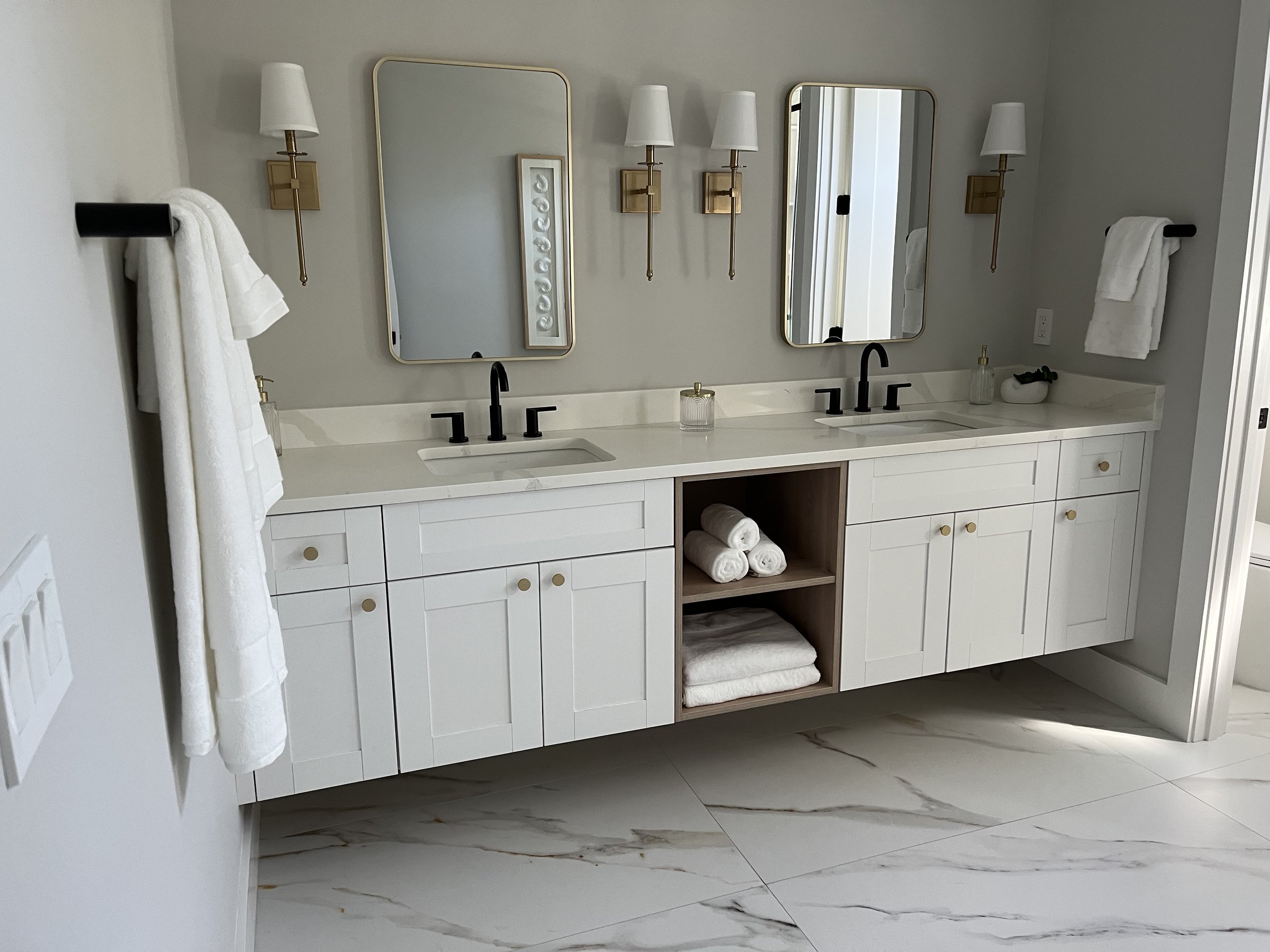 Beautiful white shaker door bathroom with mirror