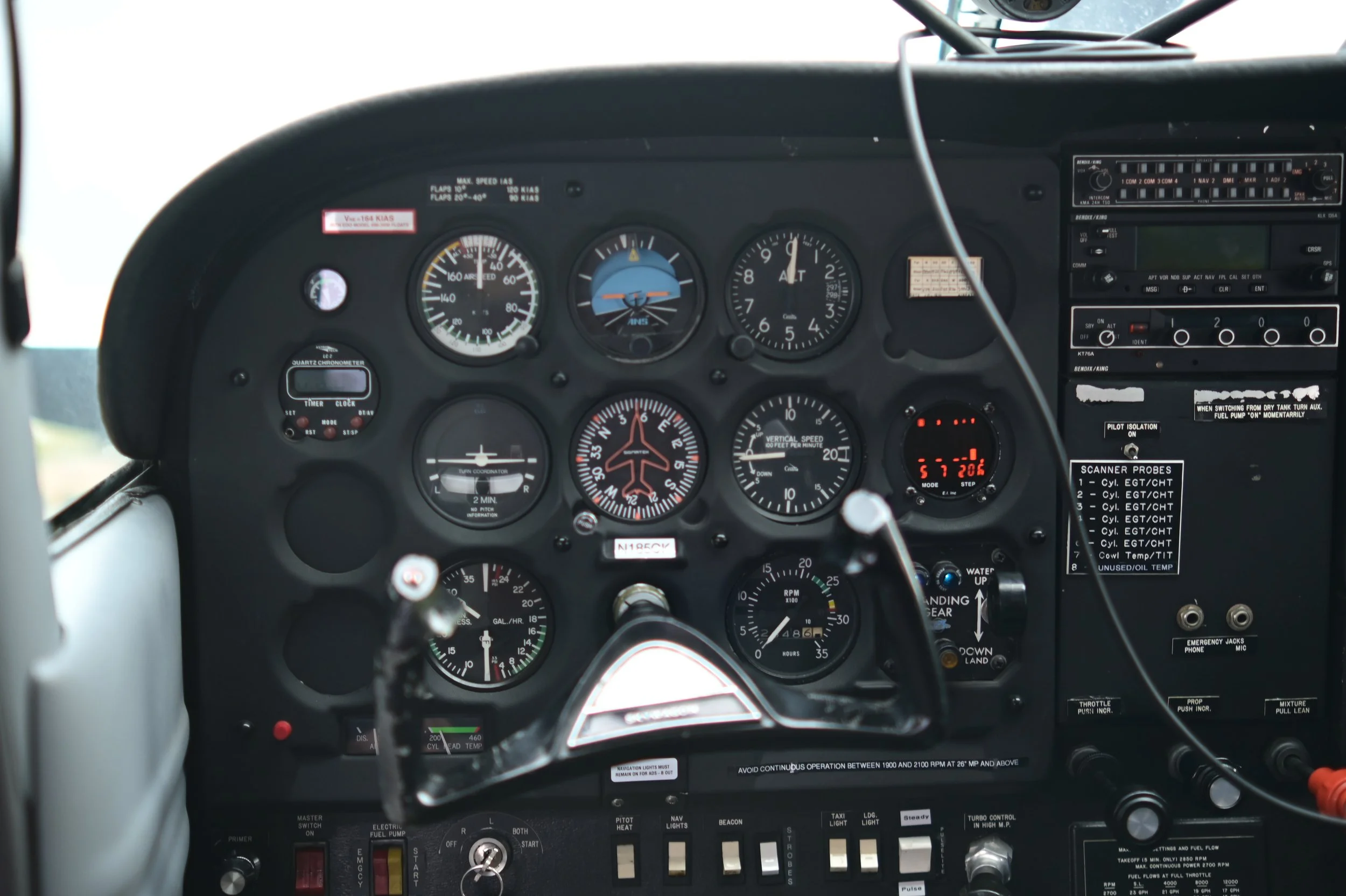 Aircraft cockpit instrument panel with gauges and controls