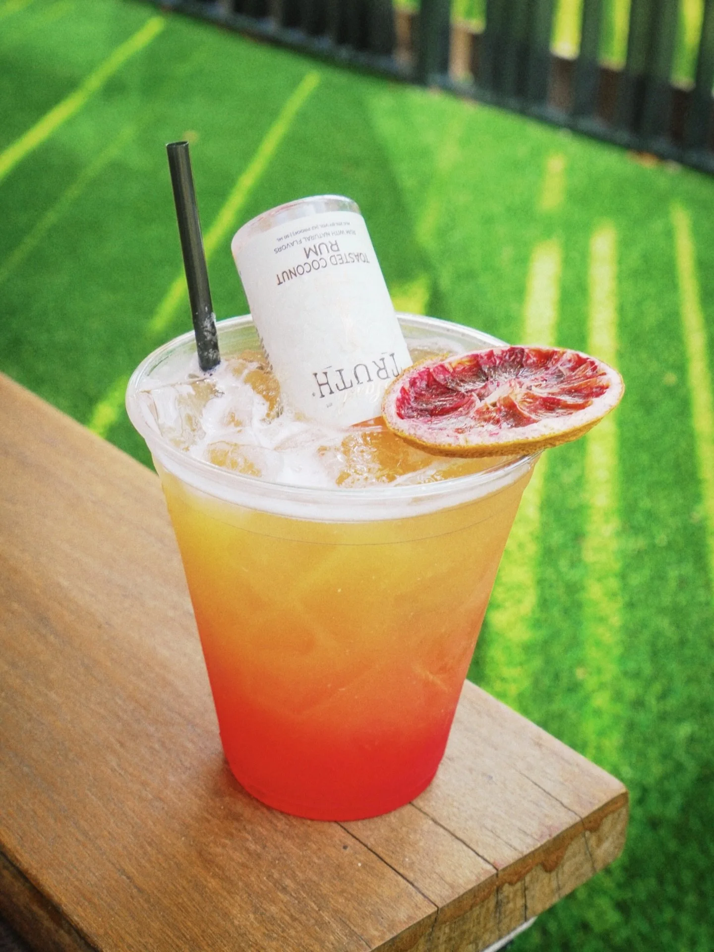 Sunday sips with Breezy Does It! 🍹Made with Rock Town salted vanilla vodka, pineapple juice, lime juice, mango, sprite &amp; topped with a Hard Truth coconut rum mini bottle.