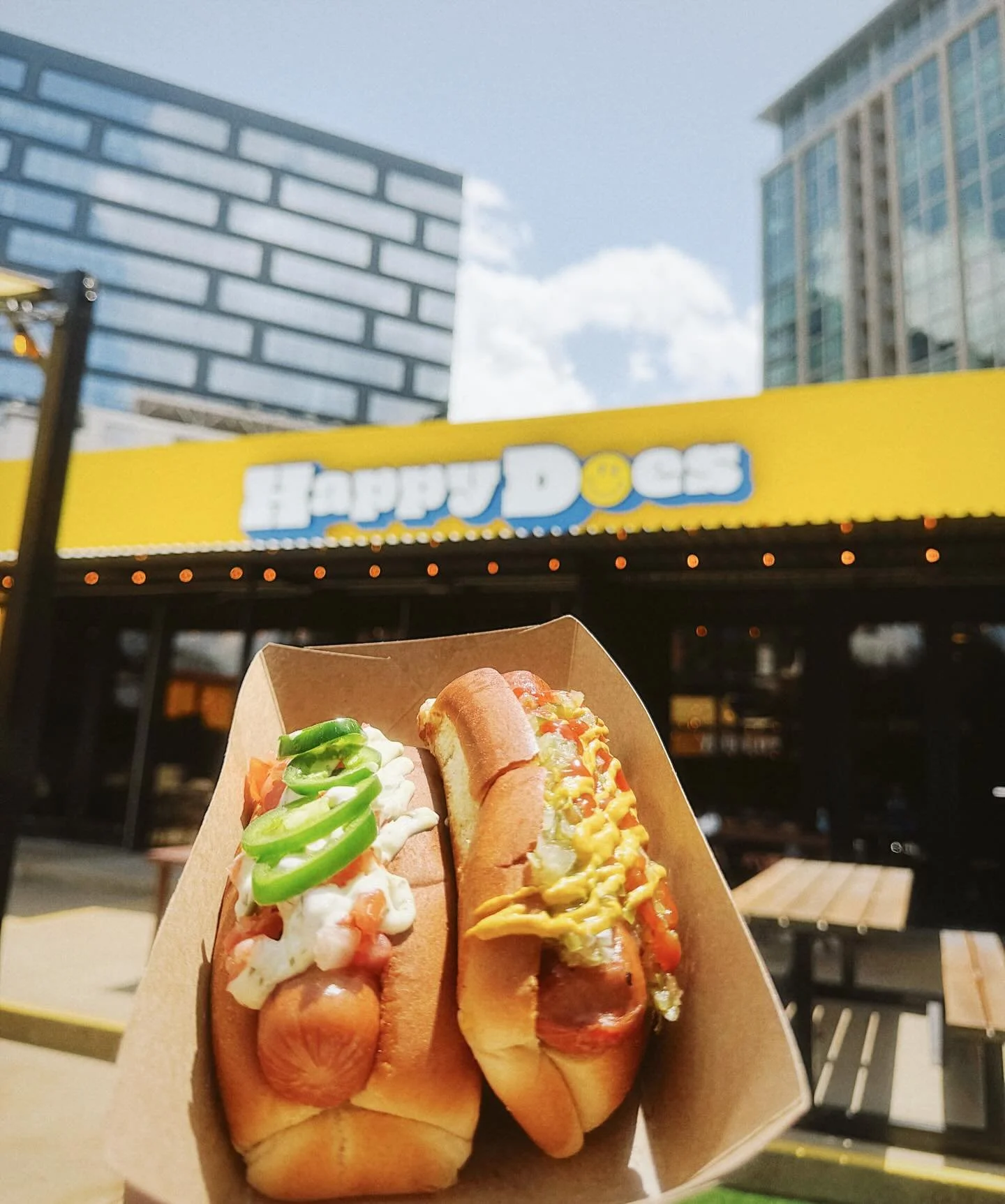 Weenies UP, sunnies ON. 🌭😎 Catch all the #MarchMadness at Happy!