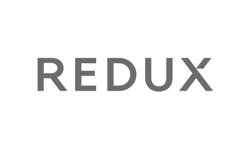 The word 'REDUX' in large gray letters on a white background.