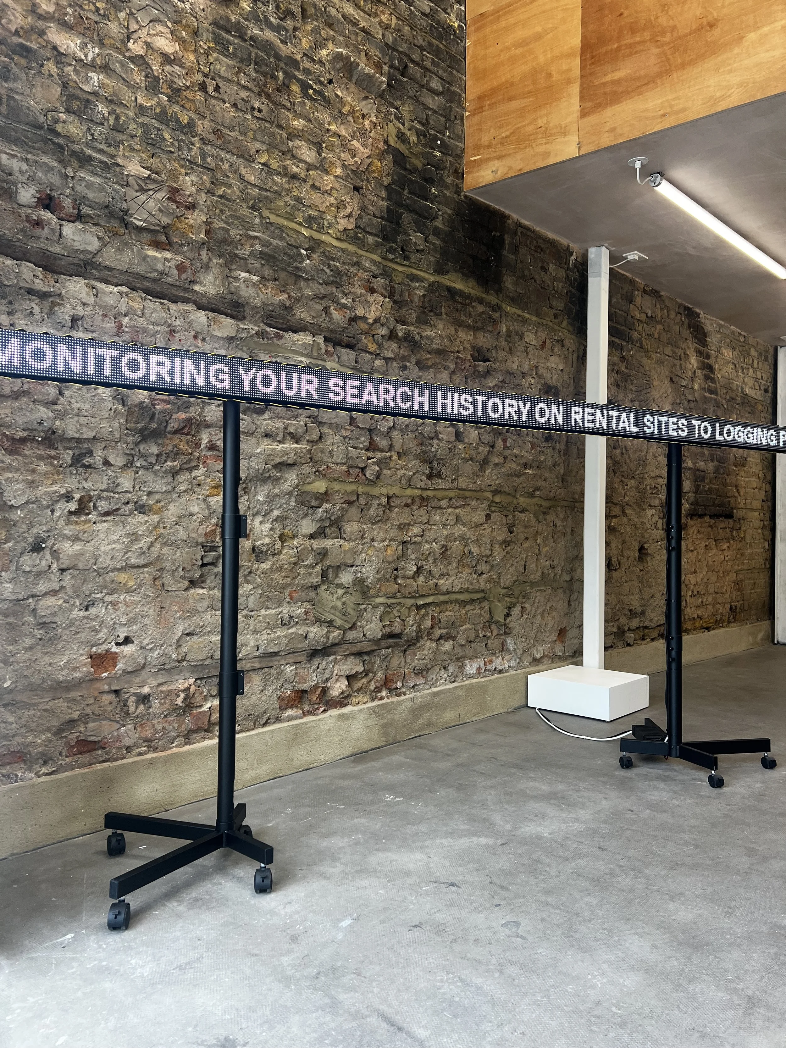 Digital poster announcing the launch of "Large Language" exhibition