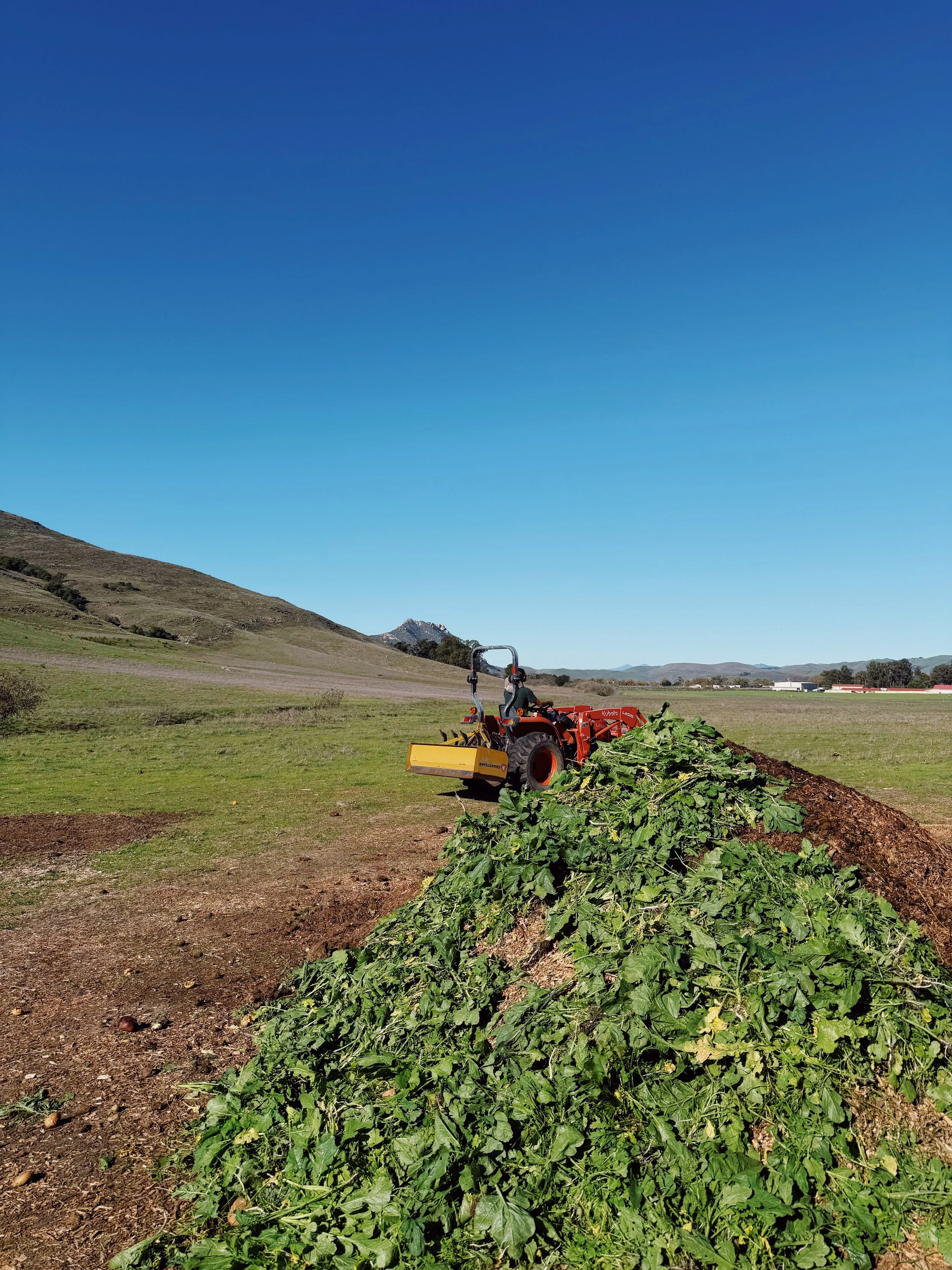 Tractor and Compost Pile
