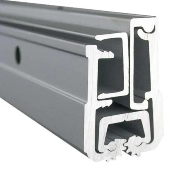 Close-up of a silver aluminum extrusion with multiple internal channels.