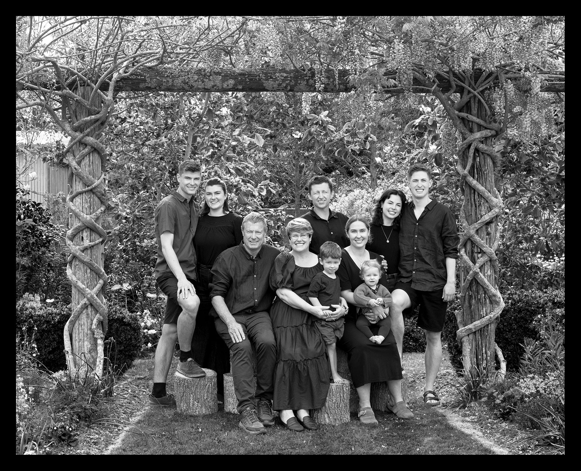 Family in garden black & white_Family Photography D Stoppard.jpg