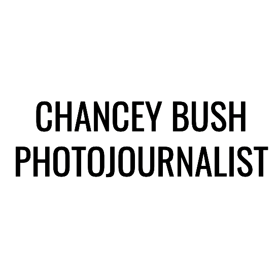 Text saying 'Chancey Bush Photojournalist' in bold black font on a white background.
