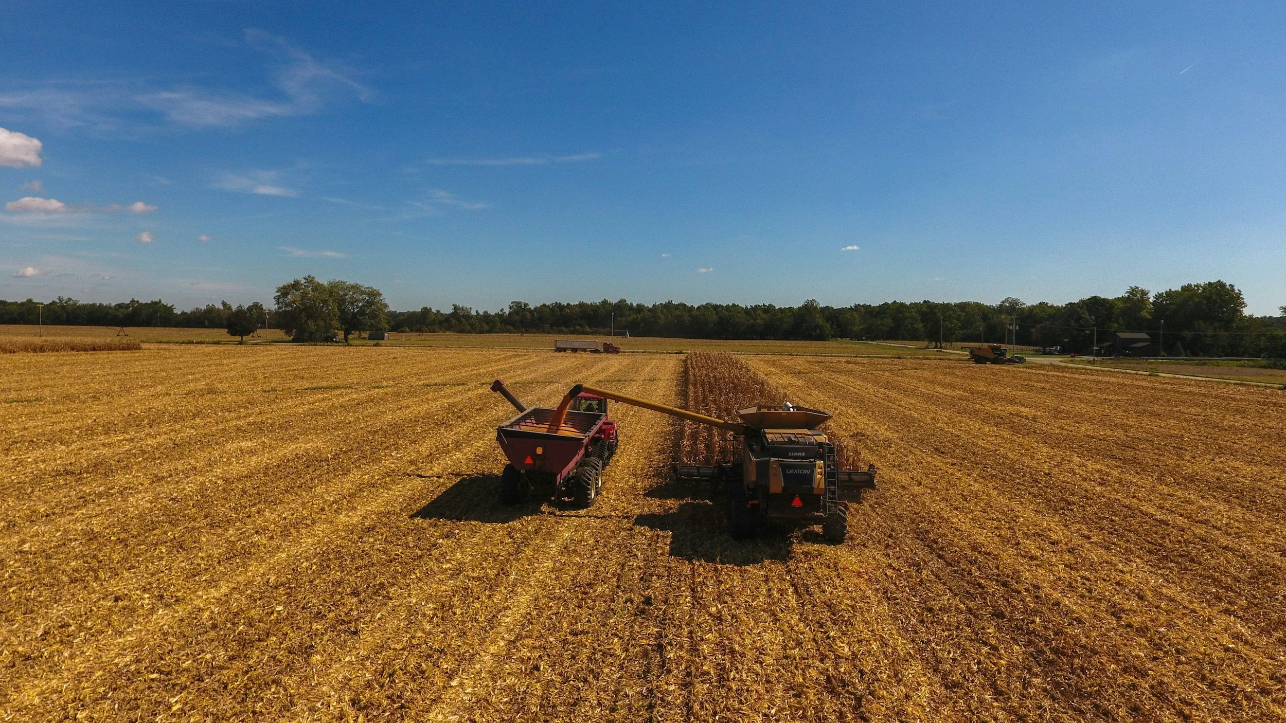 Agriculture equipment in field doing work