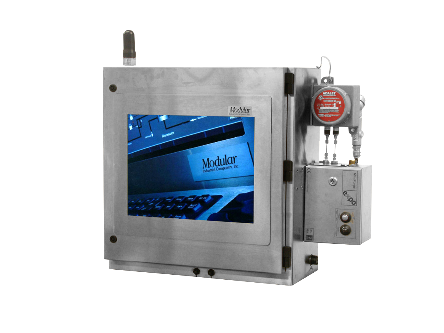 A metallic industrial machine with a display screen showing the logo of Modular Industrial Computers, Inc. It has a red circular component labeled 'ADALERT' and various control buttons and components on the side.