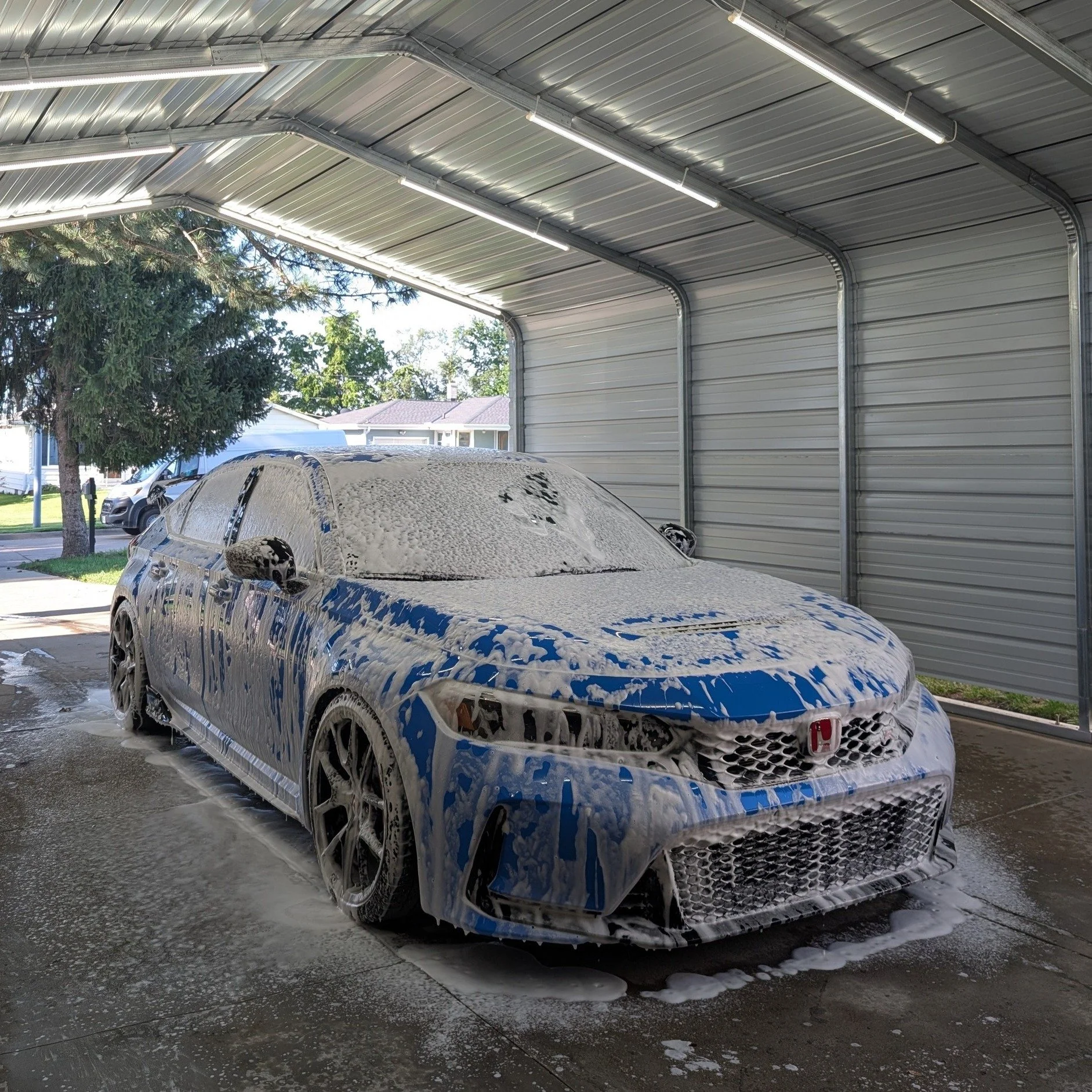 Pre‑wash foam and safe contact wash in Omaha to prep paint for decon and protection at Driven Aesthetics.