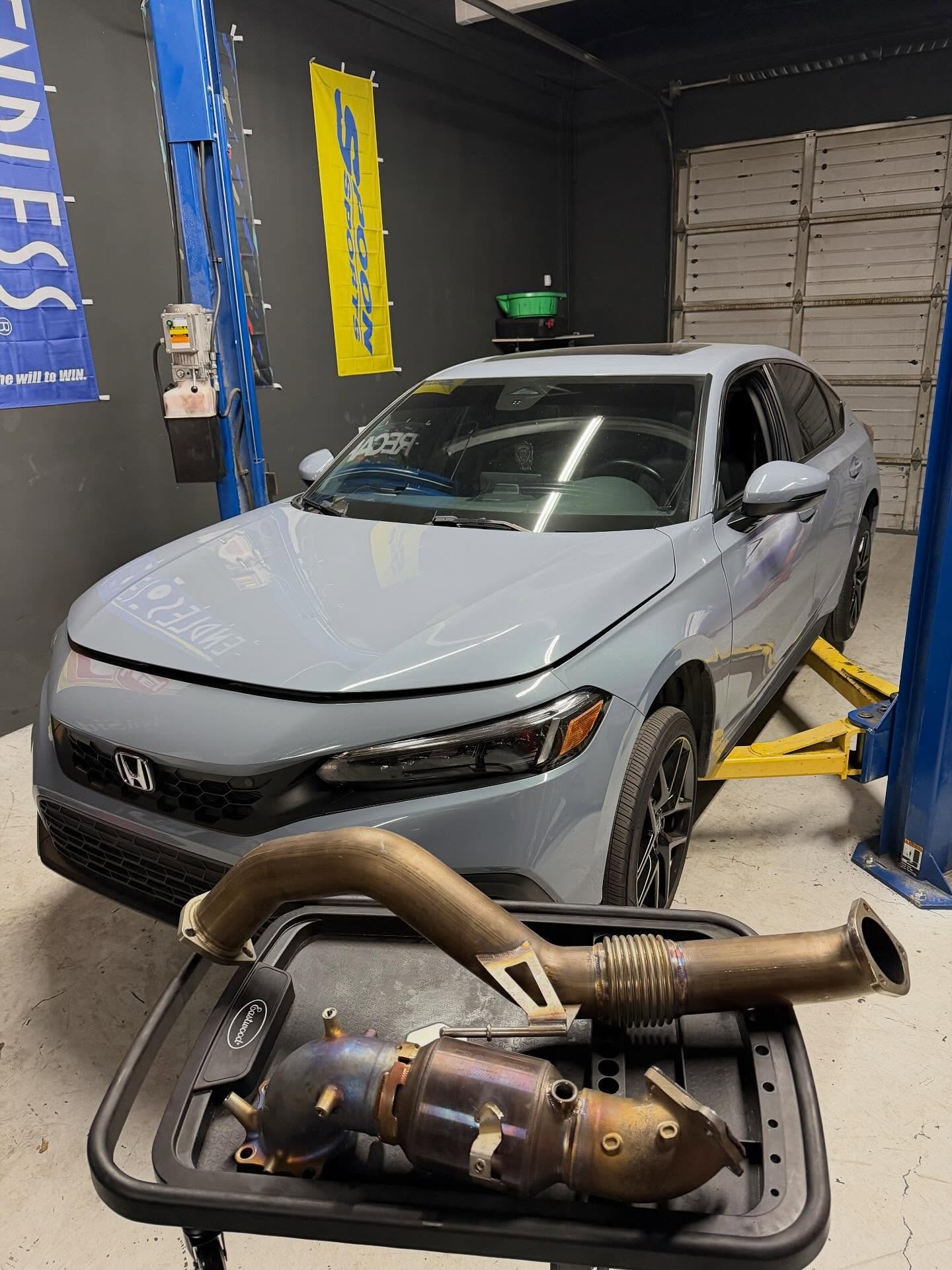 2023 Honda Civic in for some exhaust bits! 
@prlmotorsports downpipe and front pipe ✅ 

Call or text to get on the schedule! 

#honda #civic #prlmotorsports #downpipe