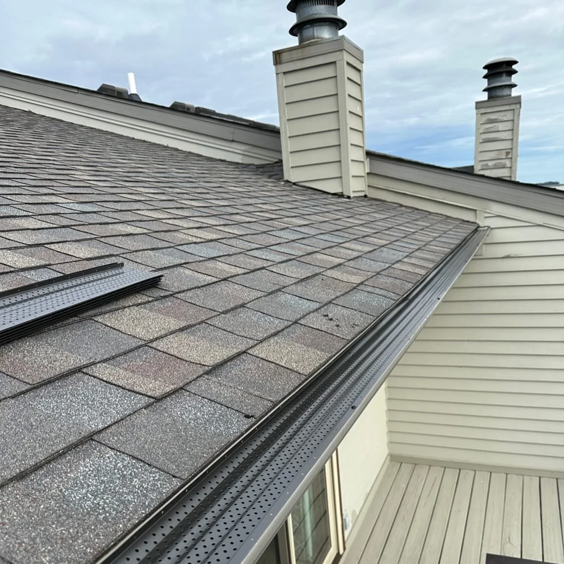 Aluminium gutter guard installation in Midland, MI