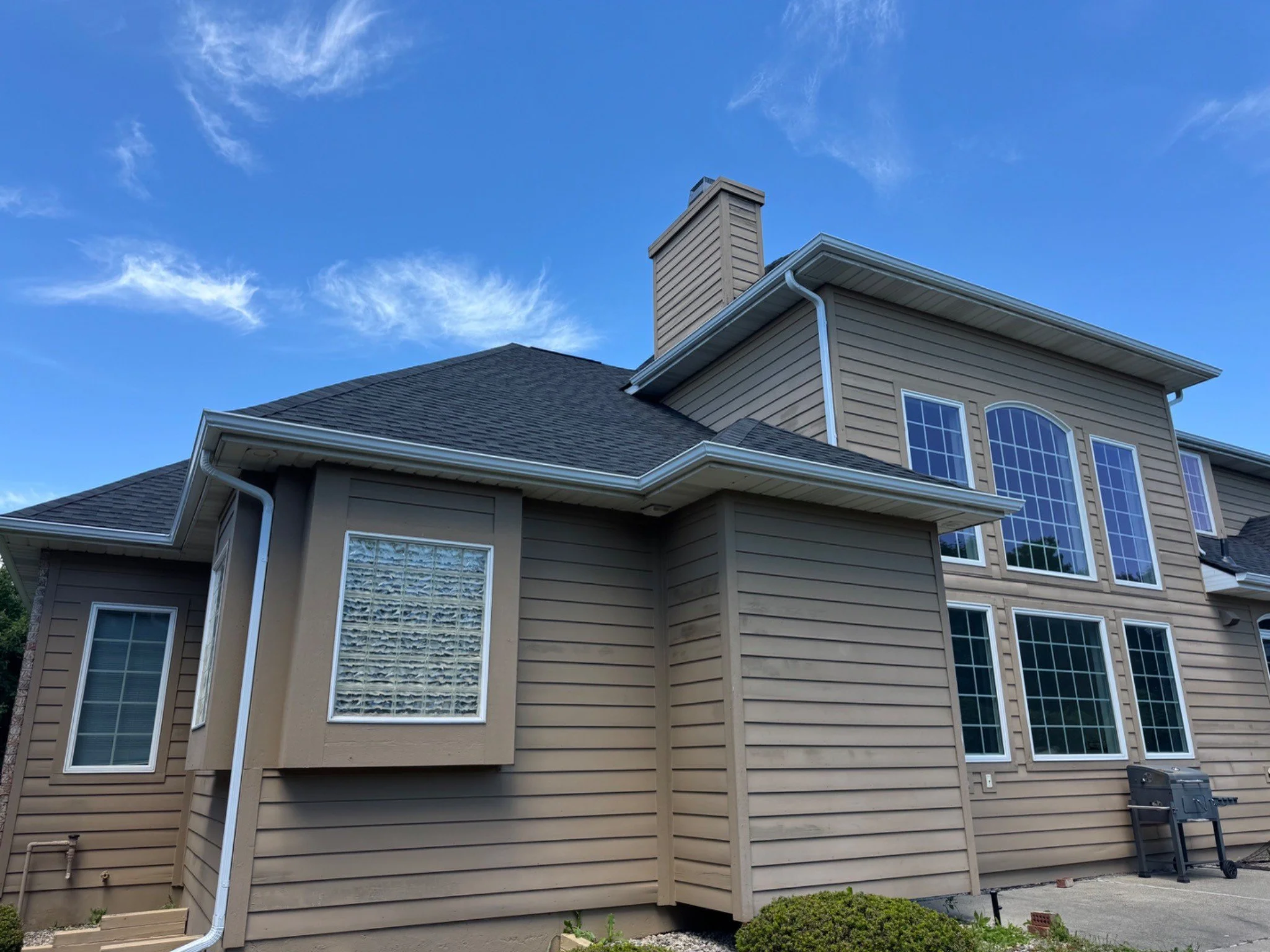 New gutter installation on the rear of a home in Saginaw Township, Michigan