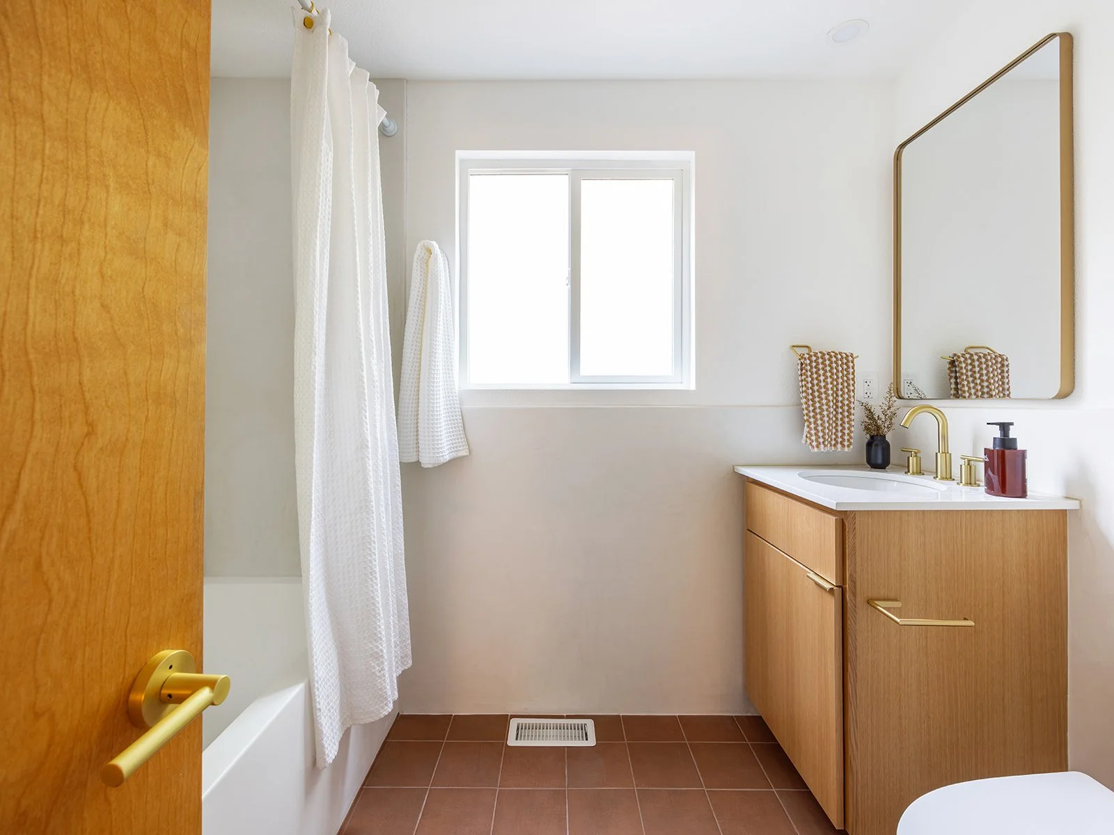 hall bath terracotta flooring and microcement