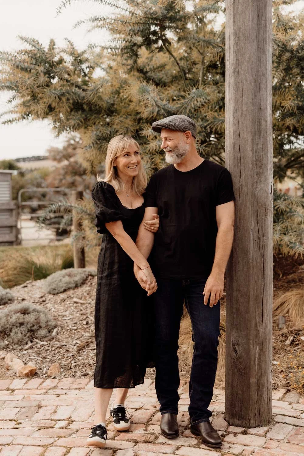 Cohen and his wife holding hands