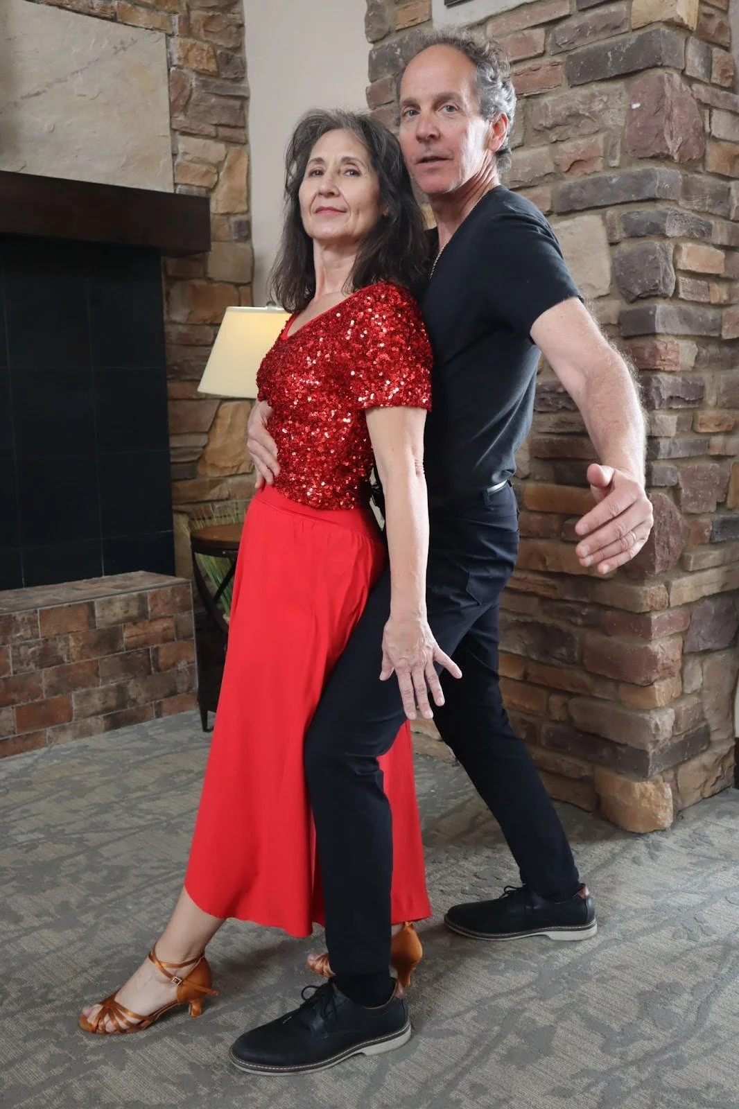 Val in red & Chris.jpeg