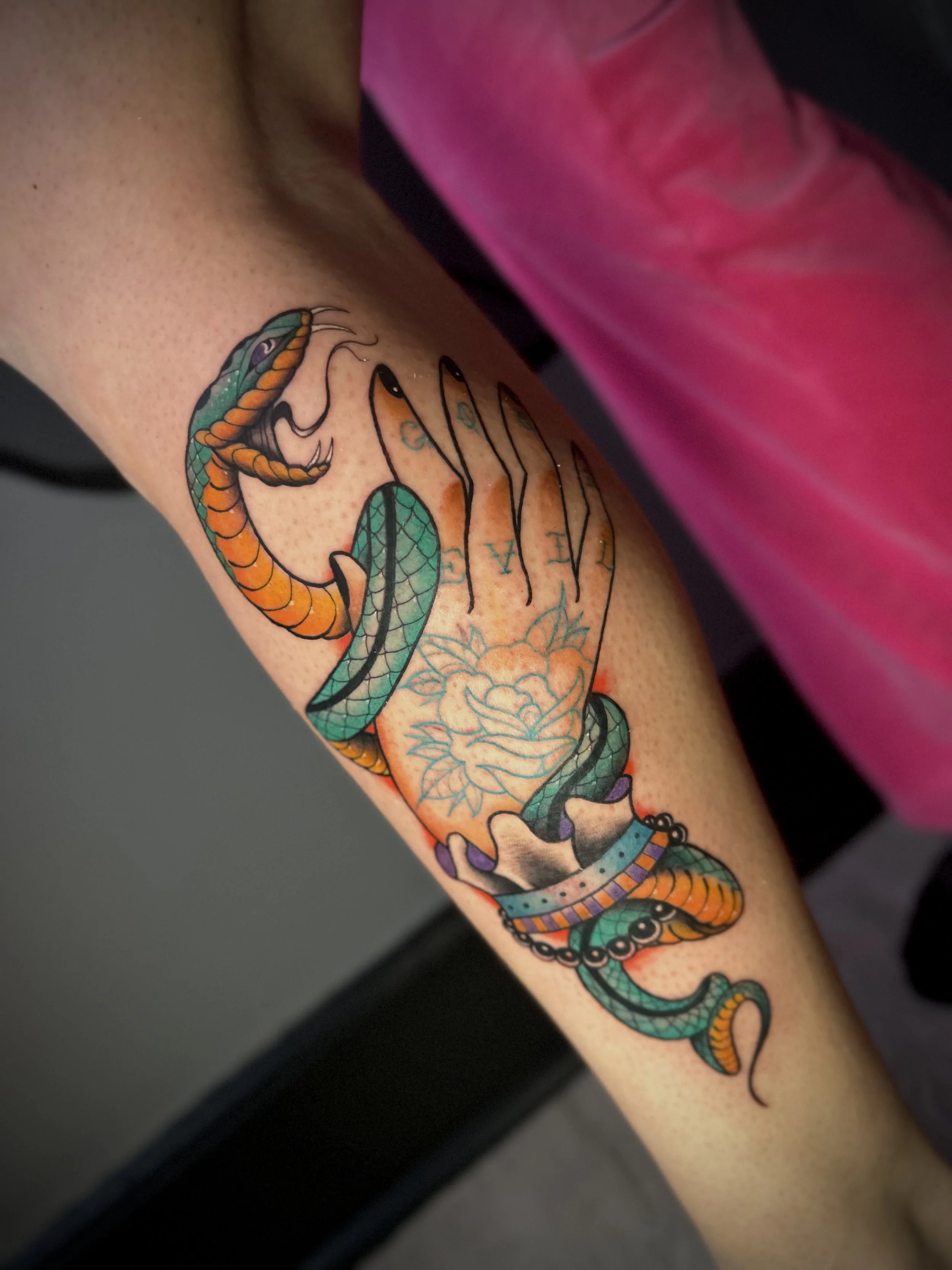 Neo Traditional snake and hand tattoo. Full color