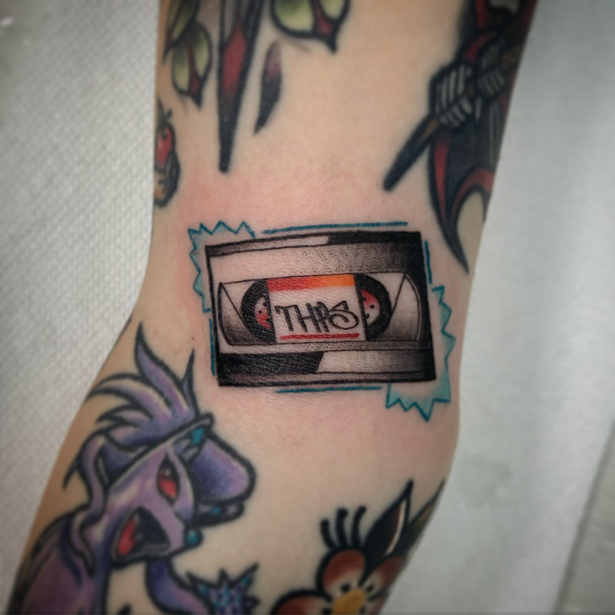 Neo traditional Tony hawk pro skater secret tape tattoo elbow ditch