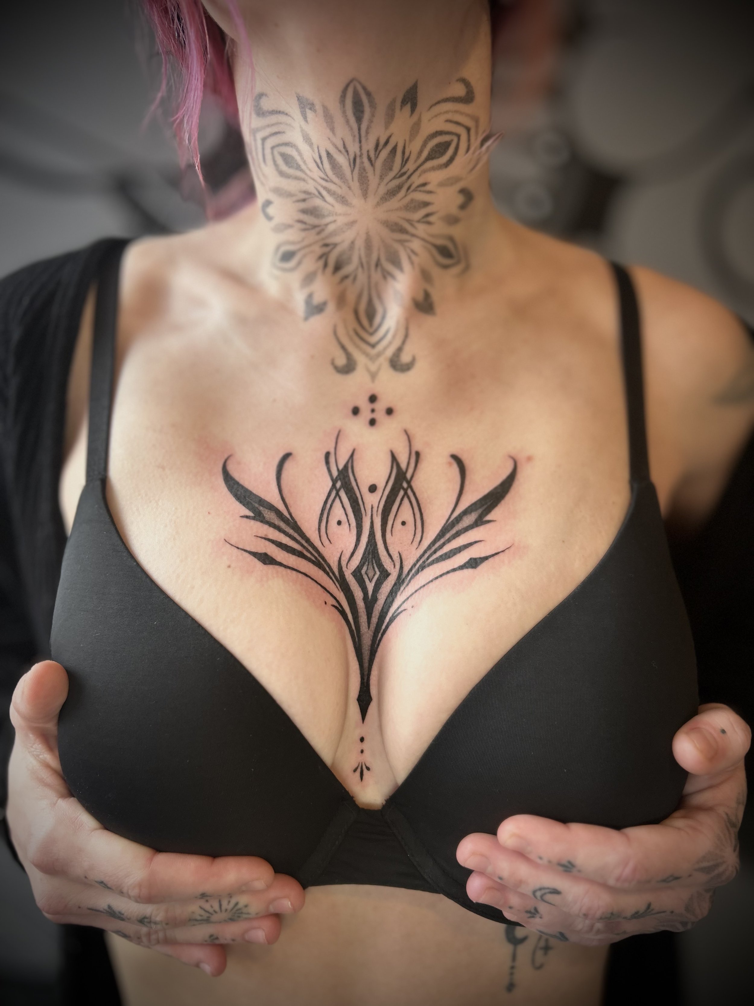 Gothic chest piece black work tattoo