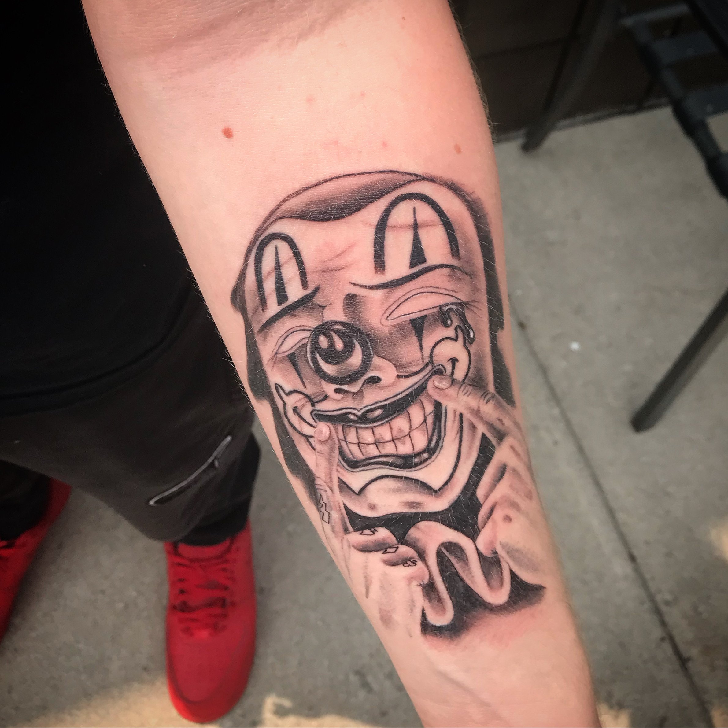 Chicano happy face clown black and grey tattoo