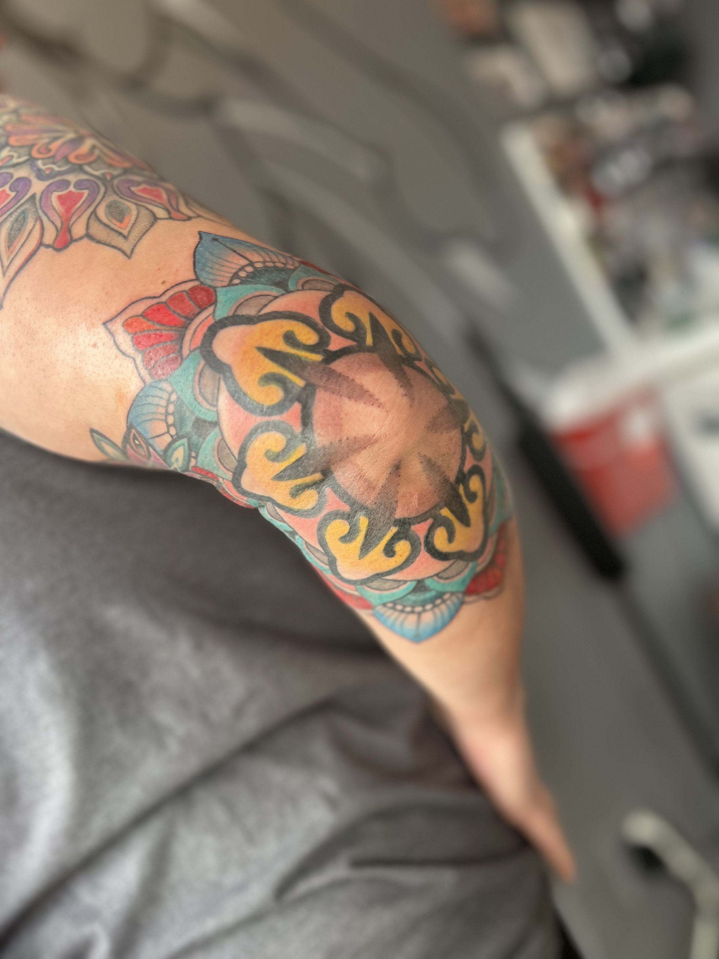 Elbow mandala tattoo color sacred geo