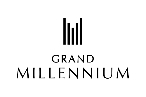 Black silhouette of a mother pig and piglet, with the mother pig standing and the piglet sitting.