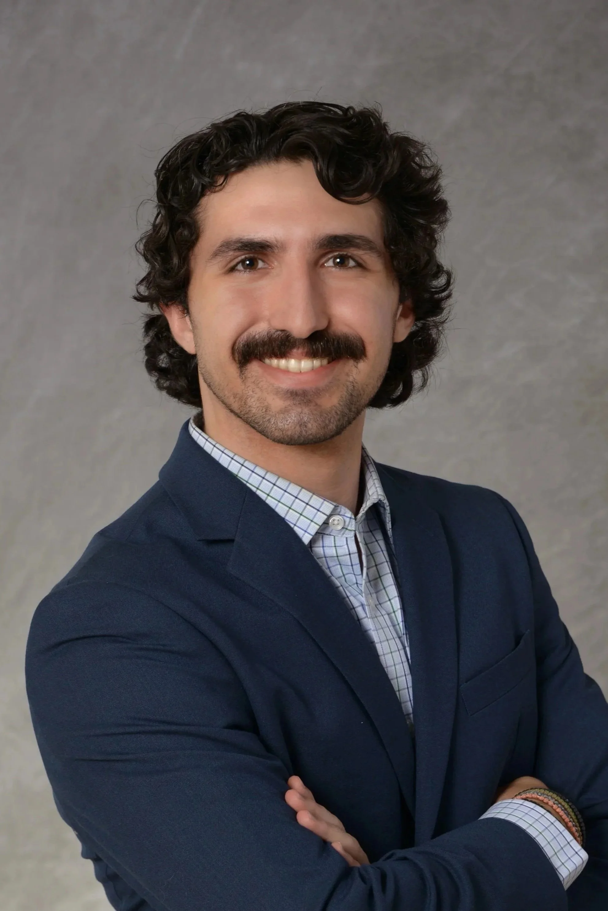 Professional headshot the CPA owner of Akouson Financial, providing tax preparation and planning services in Massachusetts.