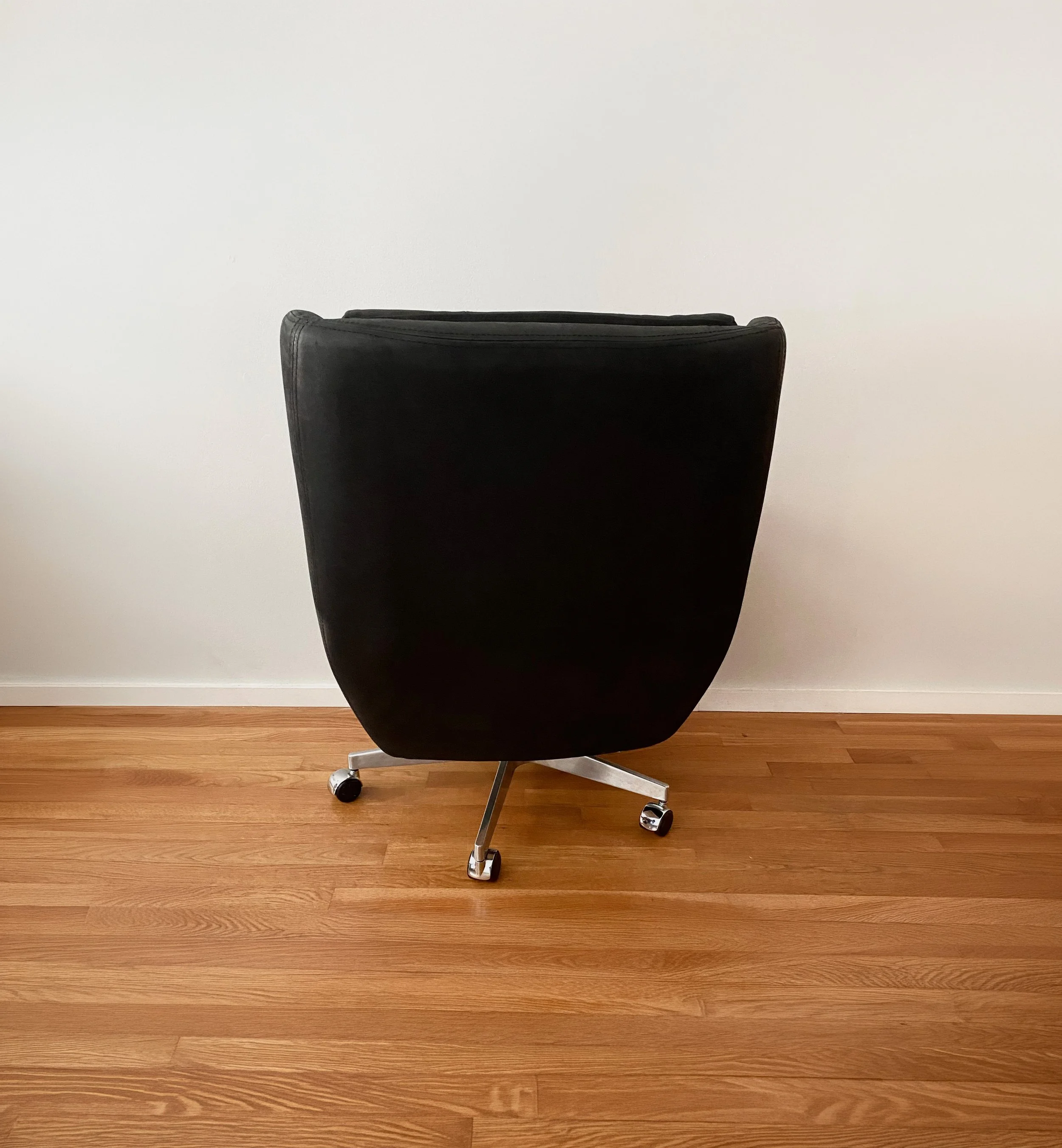 Rear view of an RH office chair featured in the Worth More brand messaging case study.