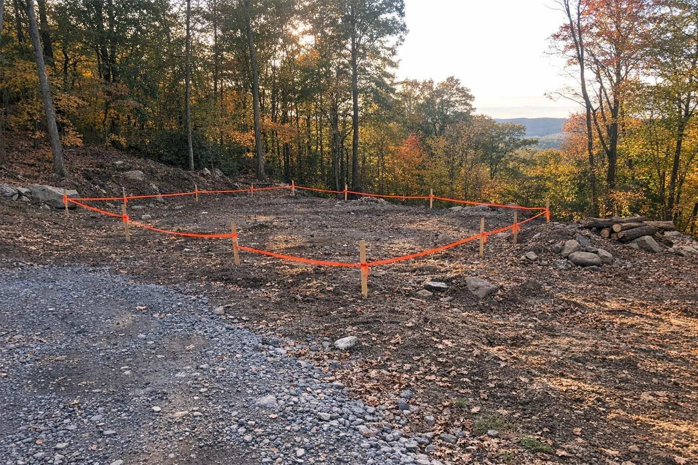 Staked house site on a wooded Hudson Valley hillside lot