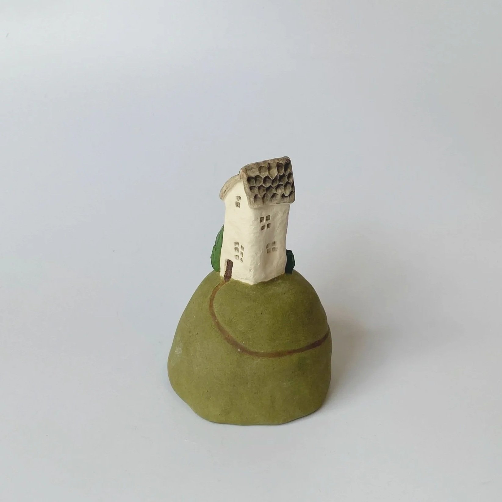 Little House on a Hill [variation]. 2025.
Ceramic with Underglaze.
H 9cm W 6.5cm