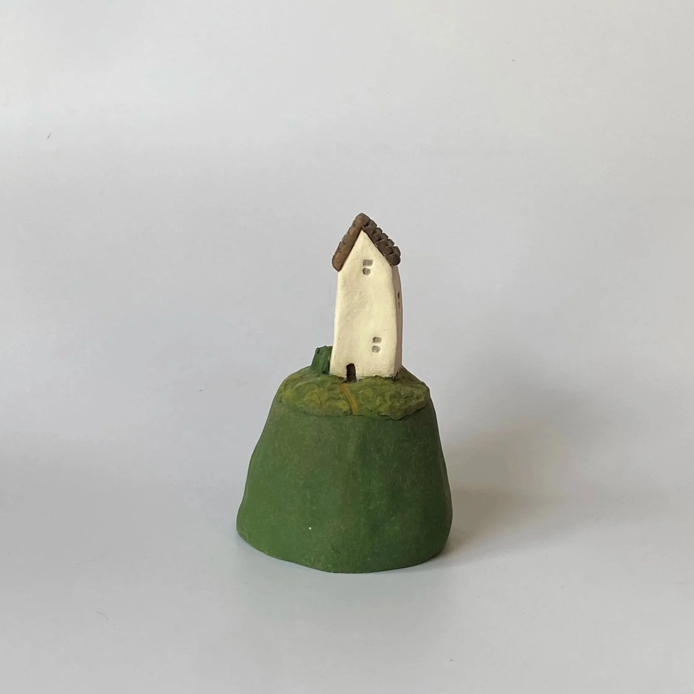 Little House on a Hill [variation]. 2025.
Underglazed Ceramic. 
H 9cm W 6.5cm.