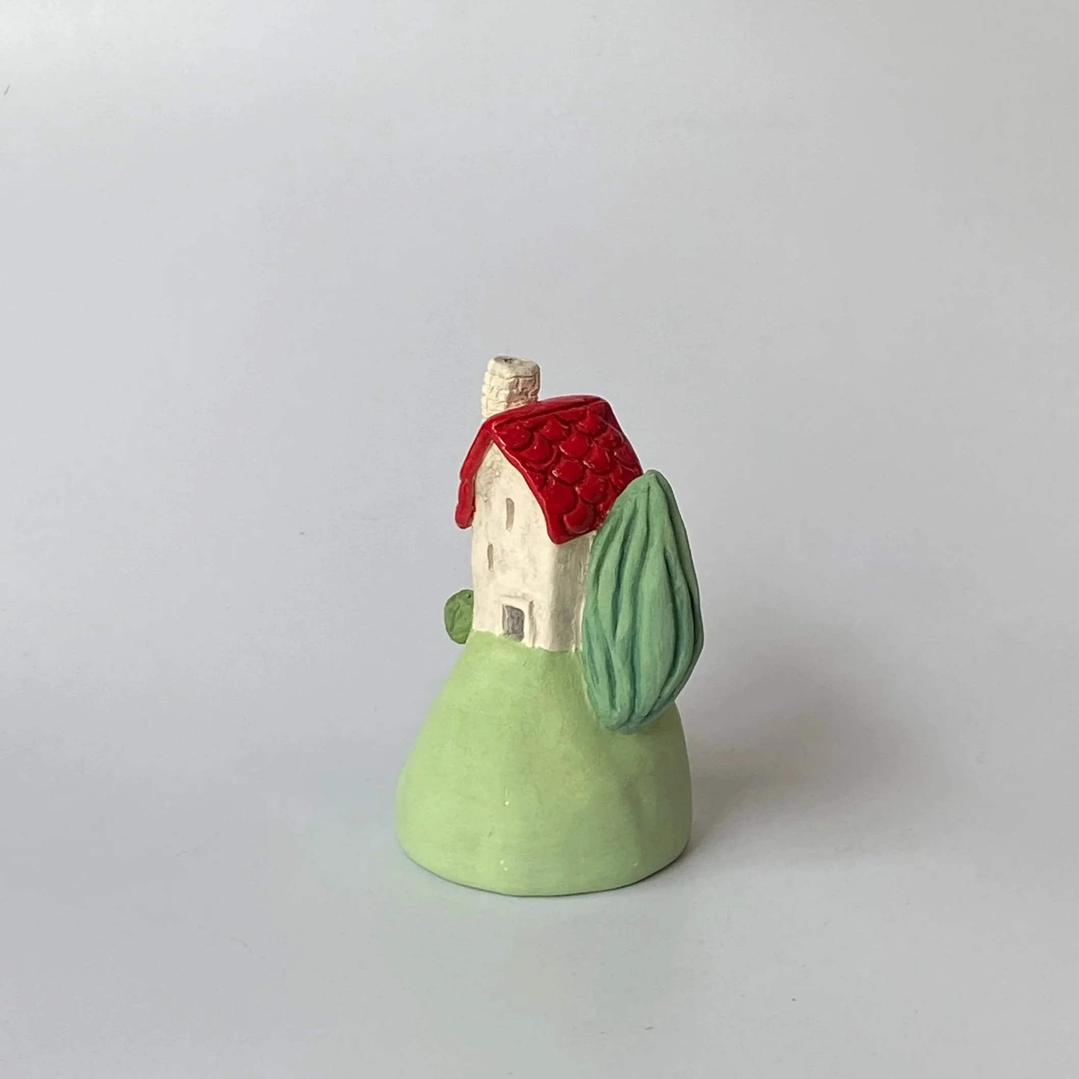 Little House on a Hill [variation]. 2026.
Glazed and Underglazed Ceramic.
H 9cm W 5cm.