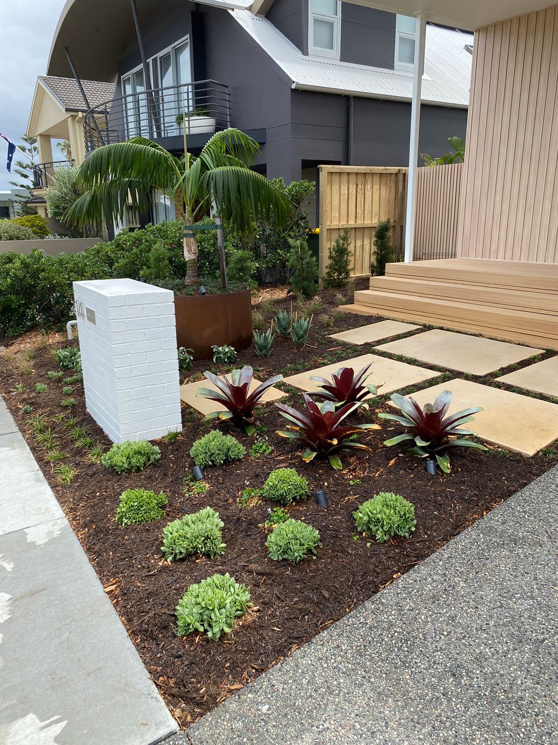 TG-Gardenscapes_Our-Projects_Berner-Street_Merewether_Garden-Bed-with-Potted-Palm-Tree-near-Letterbox.jpg