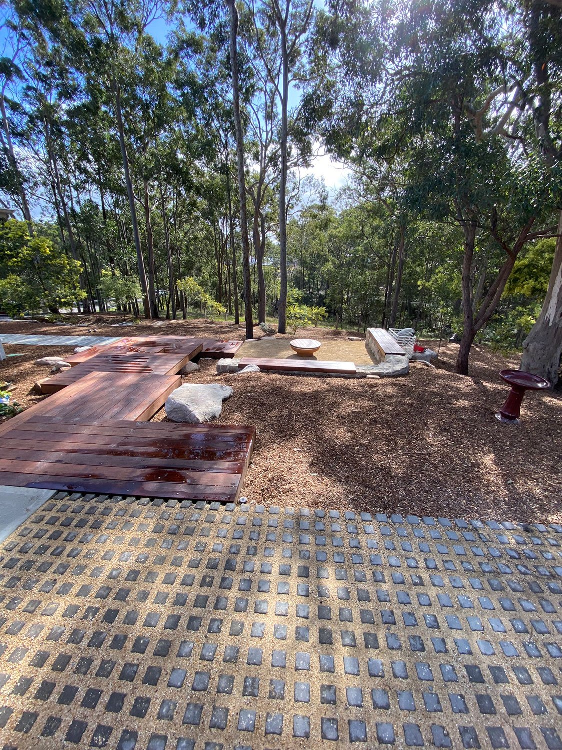TG-Gardenscapes_Our-Projects_Lake-Forest-Way_Murrays-Beach_Wooden-Steps-with-Wood-Chips-with-Firepit-Paved-Garden-Beds.jpg