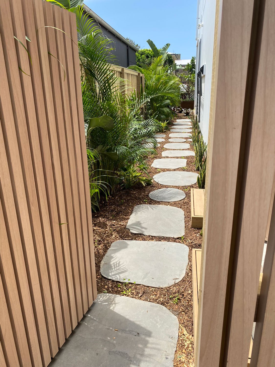 TG-Gardenscapes_Our-Projects_Berner-Street_Merewether_Side-of-House-Large-Stepping-Stones.jpg